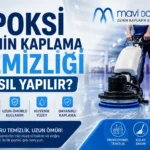 Parlak epoksi zemin üzerinde Mavi Damla Zemin Kaplama Sistemleri logosu bulunan Epoksi Zemin Kaplama Temizliği Nasıl Yapılır görseli.